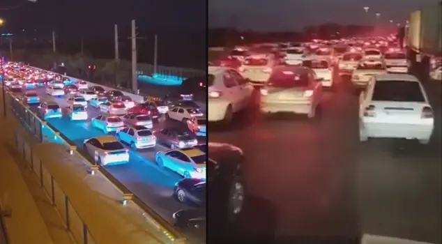 Escape from Tehran! Miles of traffic jams formed.