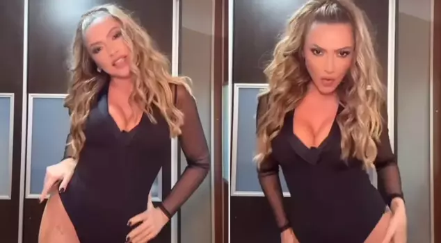 Hadise danced in front of the mirror with her bold stage costume.