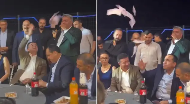 Look at the wedding celebration of the mayors! They threw money at each other.