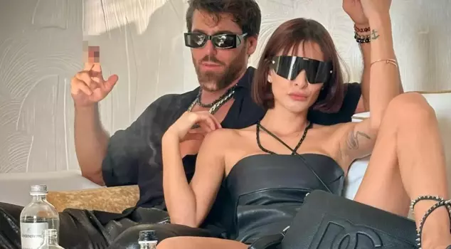 Can Yaman and his girlfriend strike a boundary-pushing pose! He took precautions with a bag.