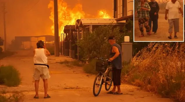 The images are from Seferihisar! They stood there staring like this from behind their houses engulfed in flames.