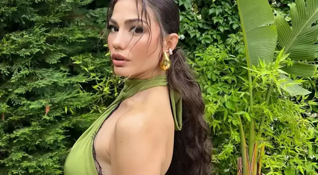 Demet Özdemir sunbathed by the pool.
