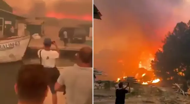 Çeşme is experiencing a disaster! People fleeing from the fire are being evacuated by boats.