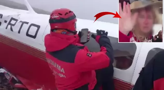 The injured female passenger waved to the team that found the wreckage of the plane.