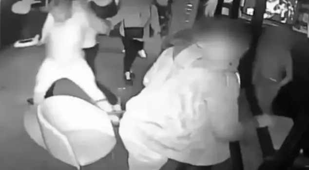 Jealous lover horror: Man cuts off the ear of a man talking to his girlfriend.