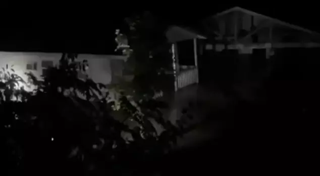 Texas Flood Disaster: A house with people inside was swept away by the waters.