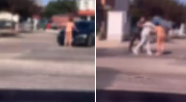 The driver assaulted the woman who blocked the way of the completely naked vehicles.