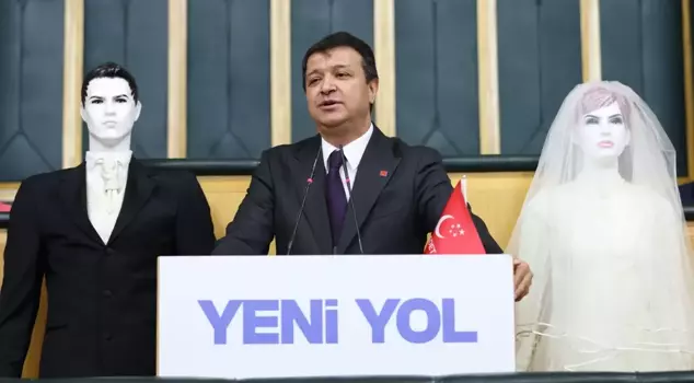An interesting protest in the Turkish Grand National Assembly! A model of a bride and groom appeared at the podium.