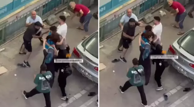 The young girl caught in the middle of the fight fainted from a blow to the head.