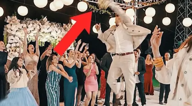 National basketball player Alperen Şengün blocks the wedding bouquet.
