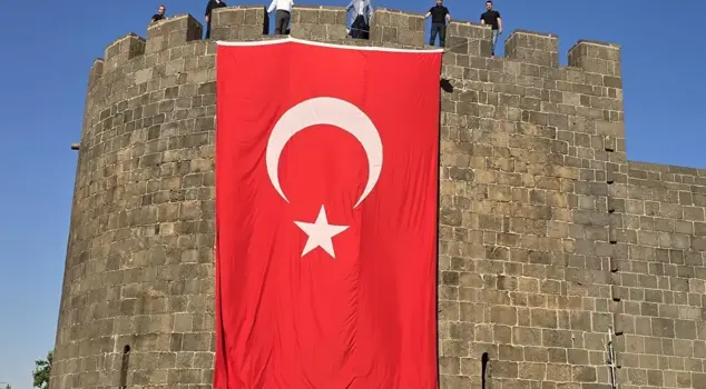 President Erdoğan made a call, and Turkish flags were hung on the walls of Diyarbakır.