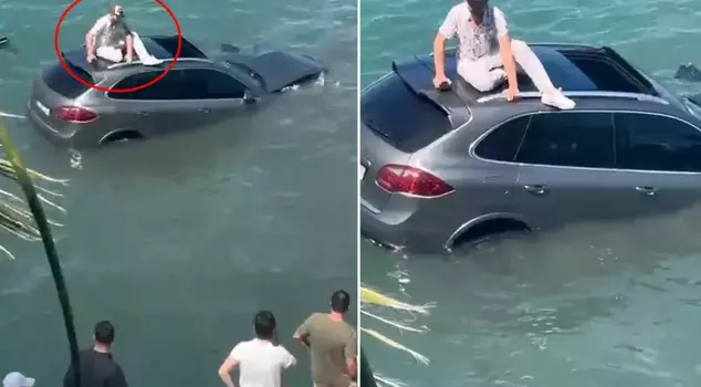 The luxury SUV that flew into the sea waited for minutes to be rescued.
