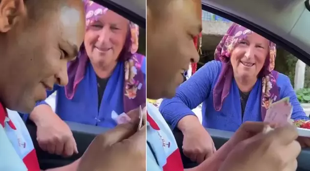 A tourist who grabbed a wad of cash mocked the woman from the Black Sea region.
