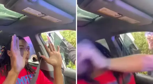 The police broke the car window and punched the driver, claiming that the headlights were not on.