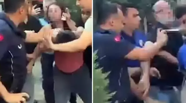 The municipal police beat the street vendor with kicks and punches.