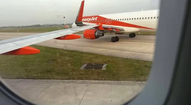 The passenger planes collided at the airport at their wingtips.