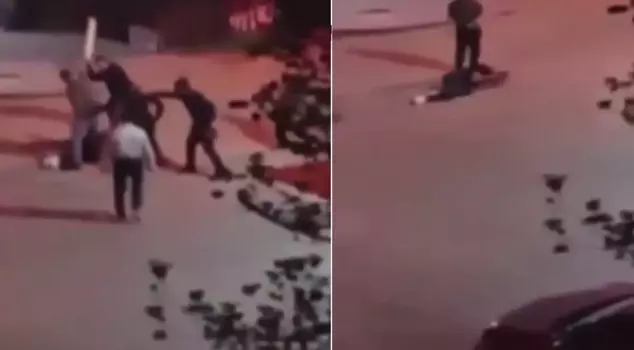 Seven people beat a man, and they stopped when he fainted.