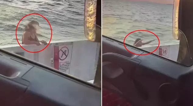The young woman jumped off the ferry and committed suicide.