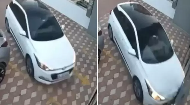 He suddenly stepped on the gas and crashed into the door, running over his neighbor.