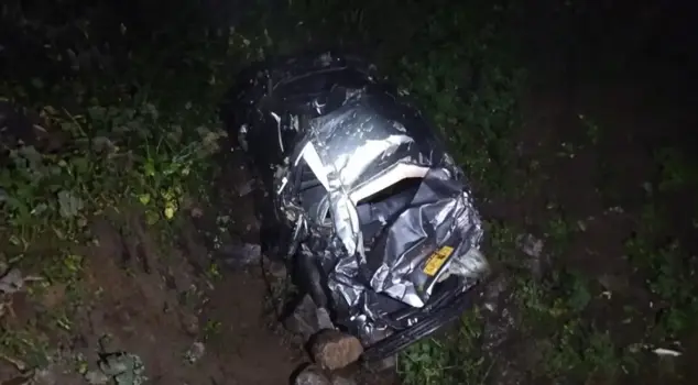 The car rolled off the cliff, and a family was lost.