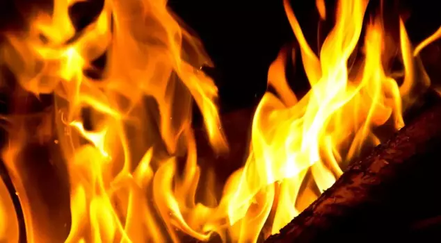 He killed his wife by burning her alive because he didn't like her skin color.
