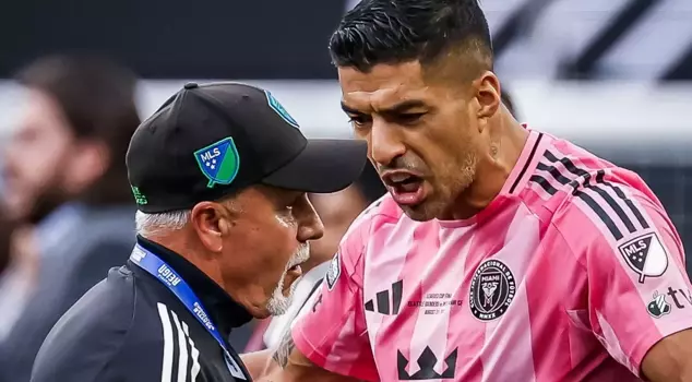 Luis Suarez banned for spitting at his opponent.