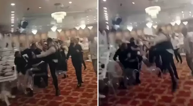 They started fighting each other in the wedding hall, throwing punches and kicks.