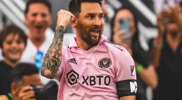 Lionel Messi is signing.
