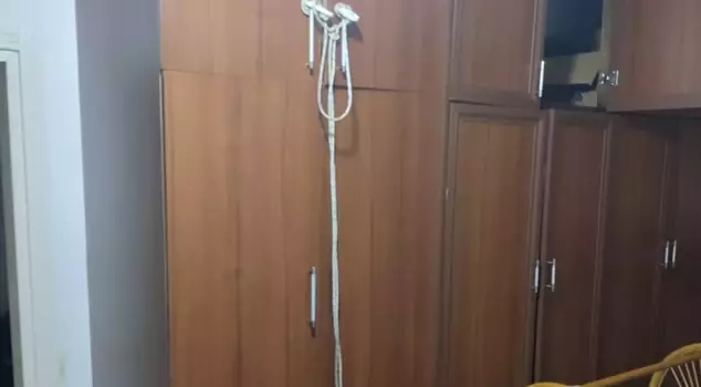 A woman who is the mother of two children was found hanging in the closet.