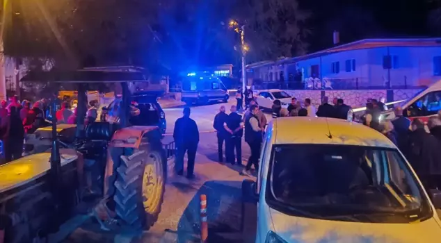 He killed two of his friends with a shotgun in the village square.