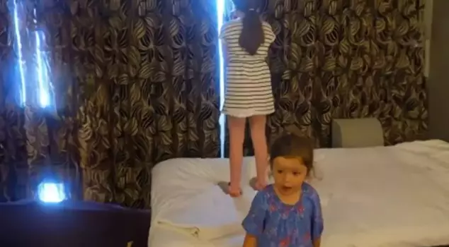 They were shocked by what they saw when they pulled back the curtain of the hotel room.