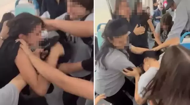 The female students bumped into each other on the tram.