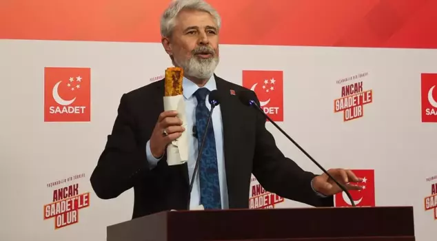 He went up to the podium holding a chicken wrap and made a calculation about 