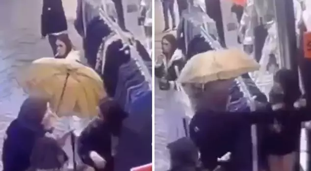 The young woman was attacked by an unfamiliar woman because she was wearing a skirt.