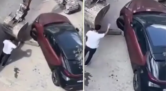 They tried to tow a vehicle with a construction machine, but they made a mess of it.