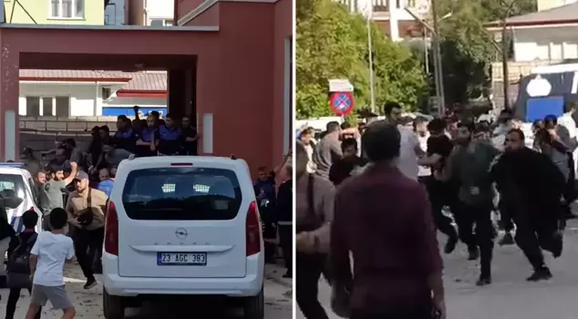 A fight with kicks and punches in front of the municipal police headquarters.