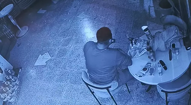 He broke the market's window with a stone and enjoyed eating and drinking inside.