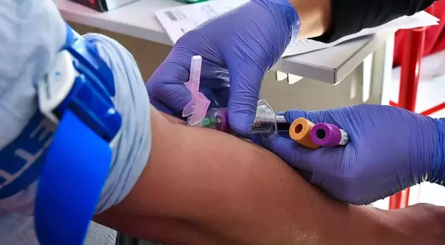 Seventeen people have been arrested for altering test results at a state hospital.