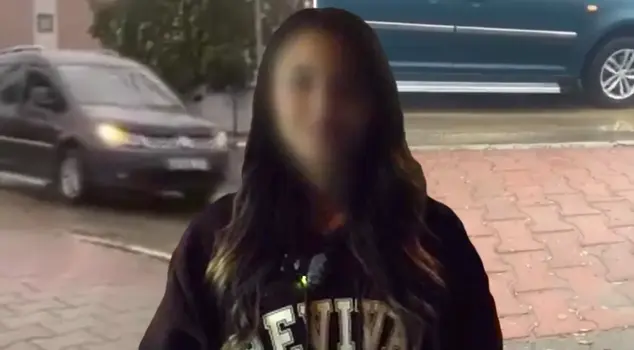 The young girl waiting at the bus stop was harassed: 