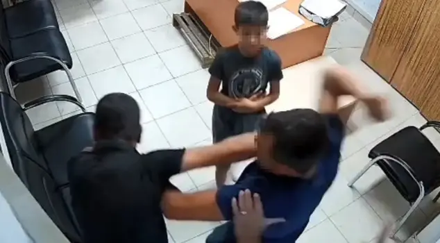 He was assaulted by his brother-in-law at the police station.