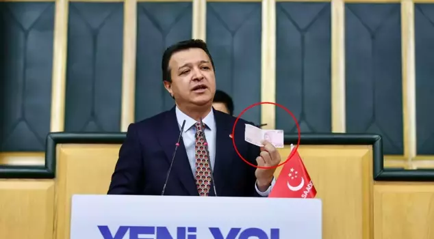 Arıkan, who approached the podium with a 200 TL banknote, listed the products he was able to purchase.