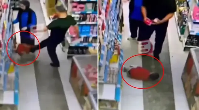 The shocking image: Look at what he did to the tiny child in the middle of the market.
