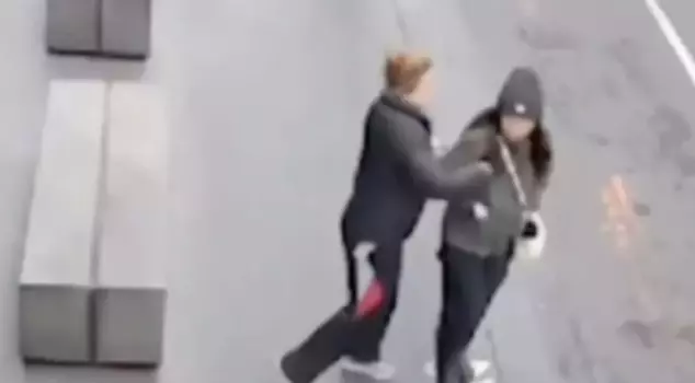 The young woman was stabbed by an unknown person while she was walking.
