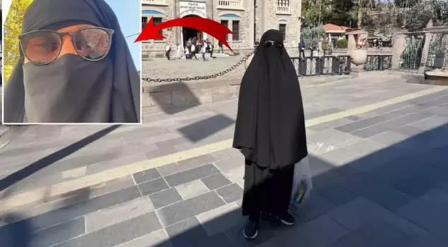 A man walking around in a bedsheet on the subway was detained.