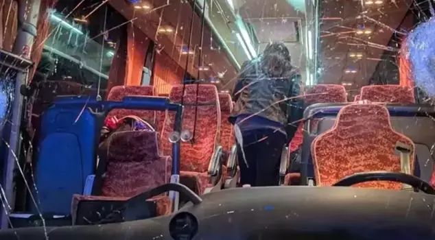 They attacked the team bus on the way back from the away game and killed the driver with a stone.