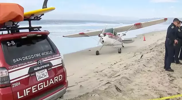 A plane with engine failure made an emergency landing on the beach in San Diego.