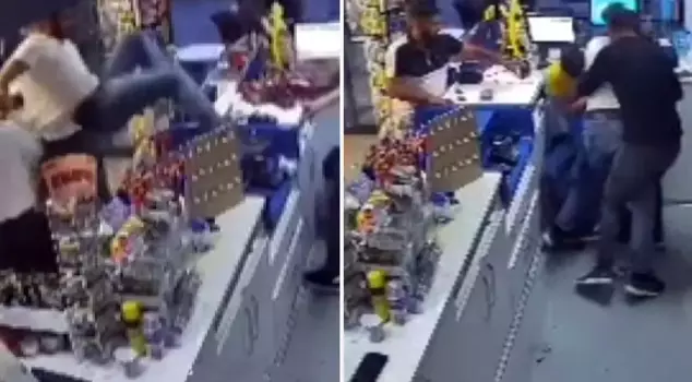Two people have been arrested for assaulting a gas station employee.