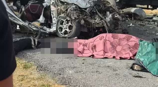 The wrecked car became a grave for a family.