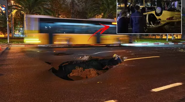 Due to heavy rain in Istanbul, the road collapsed, and a taxi that fell into the pit overturned.