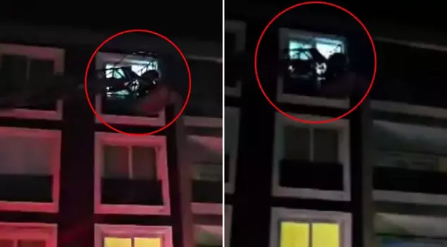 Panic doubled! They were caught on the fire ladder during the 6.1 magnitude earthquake.